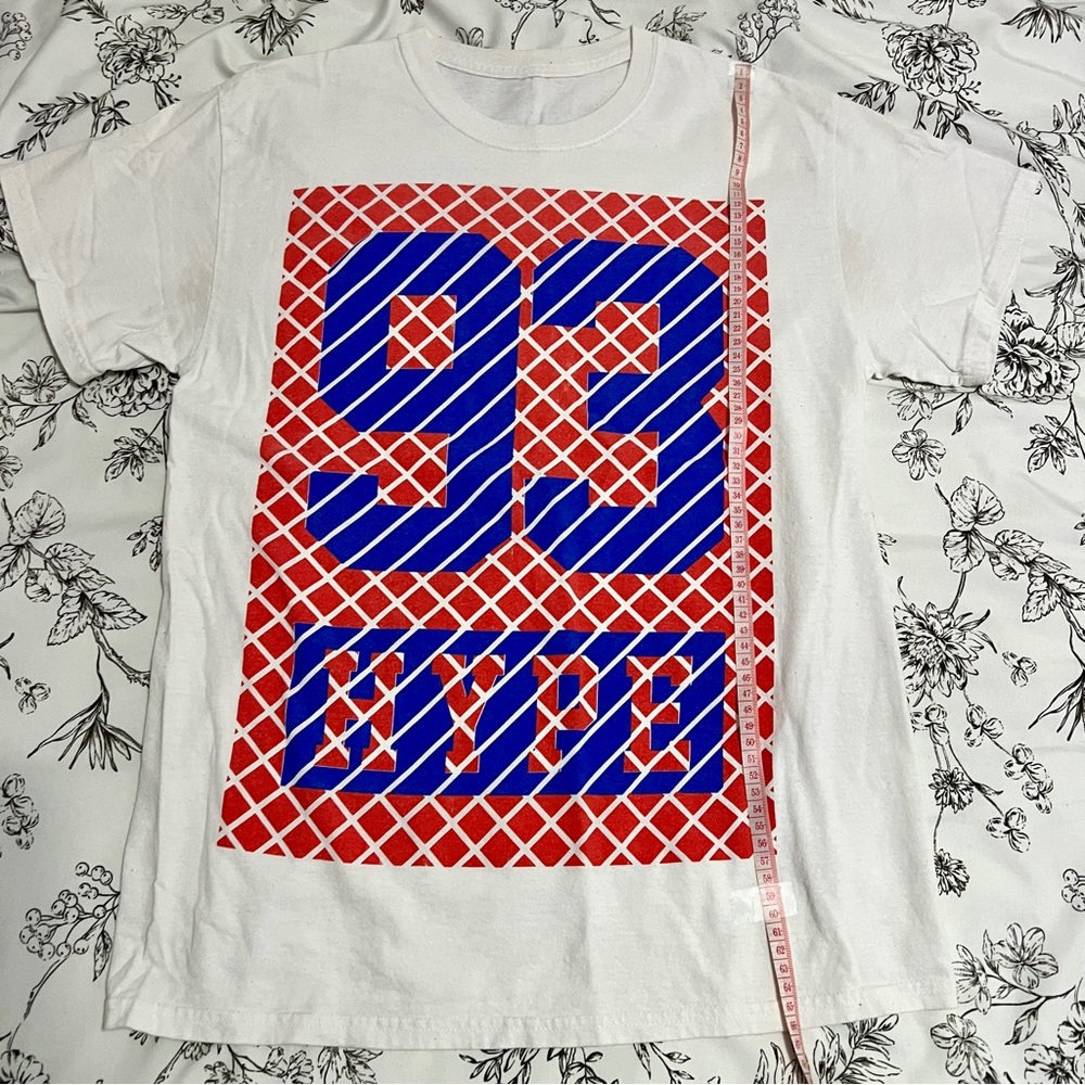 White oversize basketball tee.